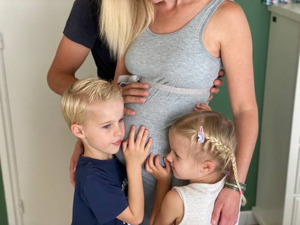 istock Pregnant mother 1251660275
