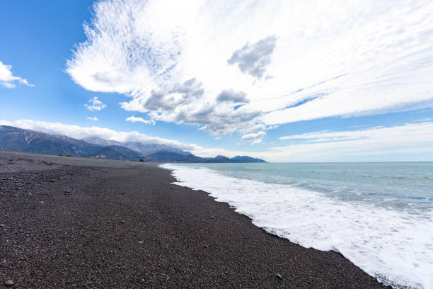 istock Wave of the sea on the sandy beach. 1251662911