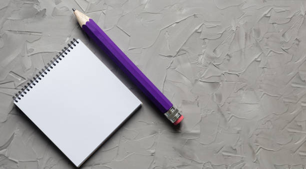 istock office supplies on gray color background with copy space, top view 1251662912