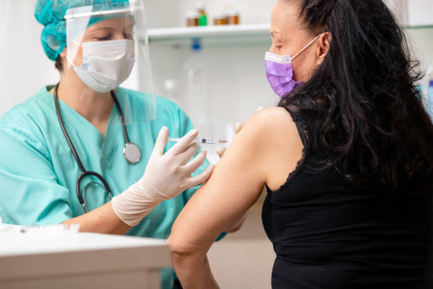 istock Patient injected with Coronavirus trial vaccine 1251667550