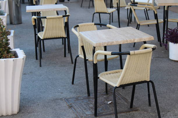 istock Restaurant chairs outside a restaurant in rome italy 1251669168