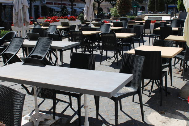 istock Restaurant chairs outside a restaurant in rome italy 1251669180