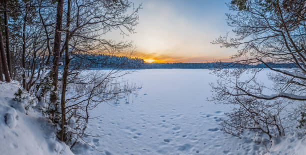 istock Sunset on the frozen lake. 1251674198