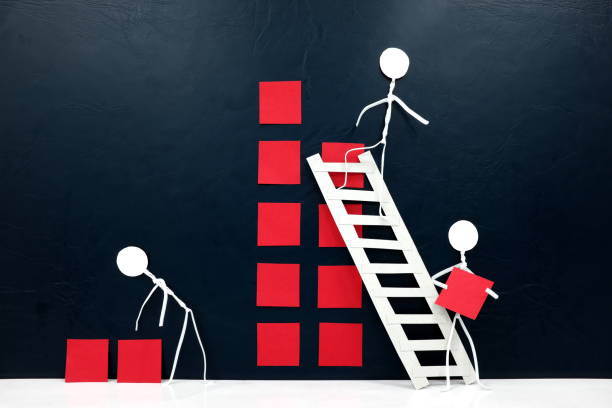 istock Teamwork, cooperation and rebuilding business concept. Human stick figures fixing broken building blocks. 1251674563