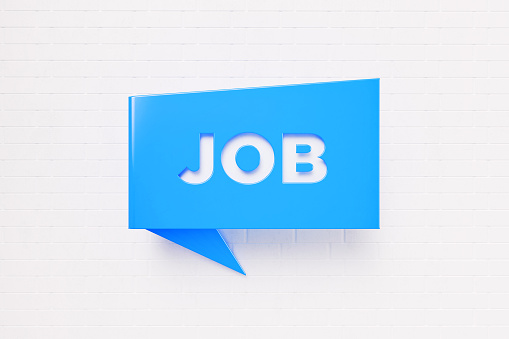 Job written blue chat bubble over white brick background. Horizontal composition with copy space. Recruitment concept.