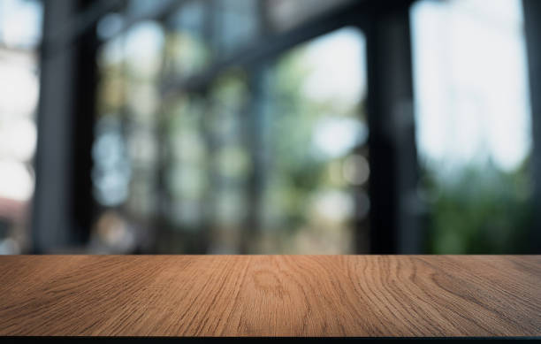 istock Wood Table Top in Blur Background room interior with empty copy space. 1251682079