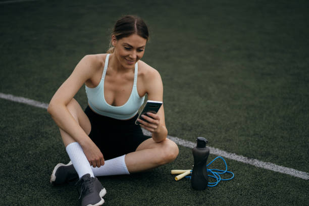 istock Active woman relaxing after workout 1251682374