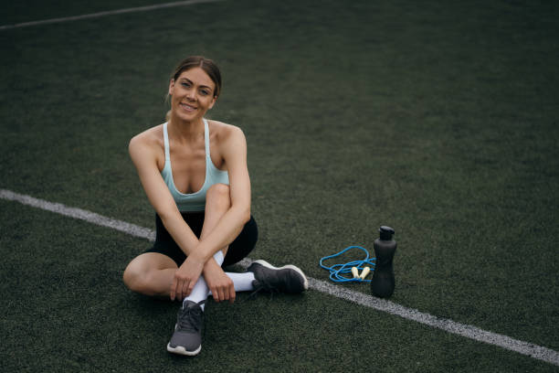 istock Active woman relaxing after workout 1251682431