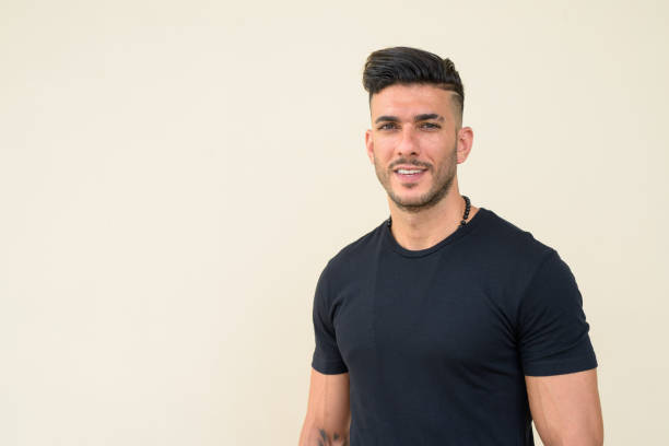istock Happy young handsome bearded Persian man smiling 1251683612