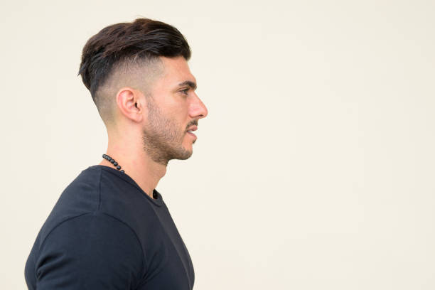 istock Closeup profile view of young handsome bearded Persian man 1251683786
