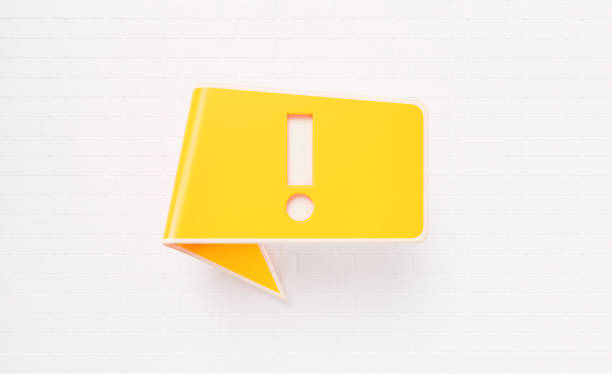Exclamation point drawn yellow chat bubble over white brick background. Horizontal composition with copy space. Alertness concept.