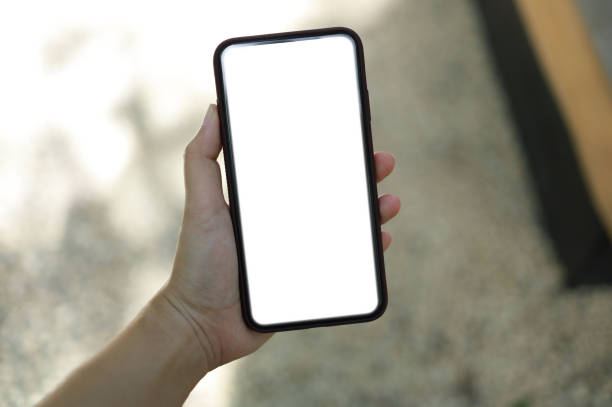 istock Women's hands holding cell telephone blank copy space screen. smart phone with technology concept 1251686938