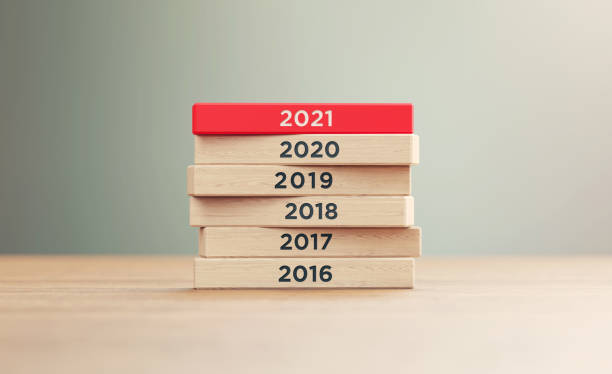 Years Starting From 2016 to 2021 Written Wood Blocks Sitting on Wood Surface in Front a Defocused Background Years starting from 2016 to 2021 written woodblocks sitting on wood surface in front of a defocused background. 2016 stock pictures, royalty-free photos & images