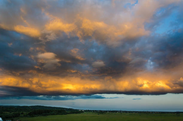 istock The sun colored the clouds 1251687999