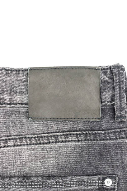 leere leder jeans label - leather patch denim jeans stock-fotos und bilder