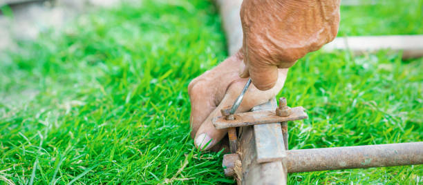 istock Elderly man twists the nut by wrench 1251690349