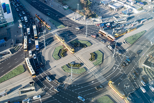 Aerial view of a major city intersection for both motor vehicles and trams (light rail/ street cars) in downtown Warsaw, Poland