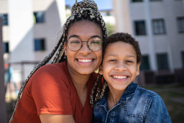istock Portrait of sibling outside 1251693318