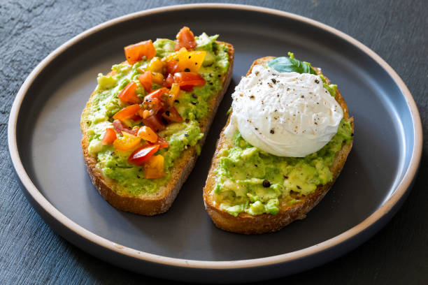 istock Tasty sandwich with poached egg and avocado 1251707737