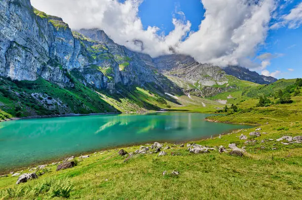 Beautiful view of Oberlegisee lake on a sunny summer day, in Braunwald, Canton of Glarus, Switzerland