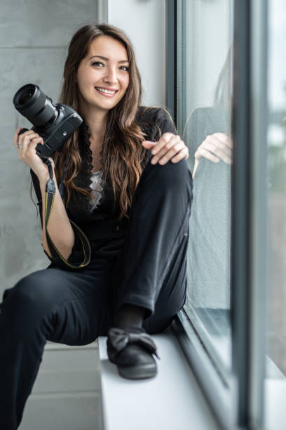 istock Female Photographer working in a studio 1251712839
