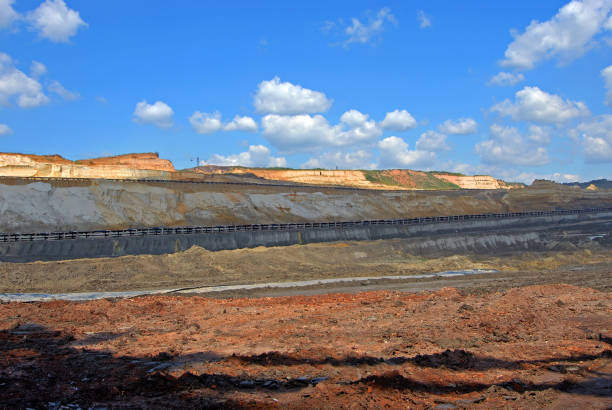 istock Conveyor belt on surface mine. Beautiful landscape of a surface mine. 1251714612