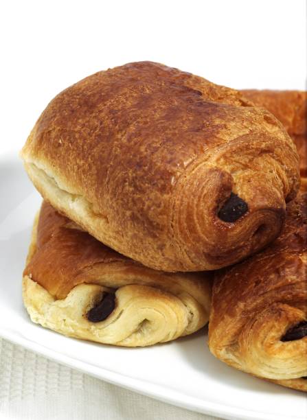 istock Pain au Chocolat, Sweet breads against White Background 1251717549