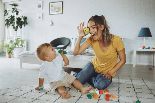 istock Mother and son playing with construction toys 1251717682