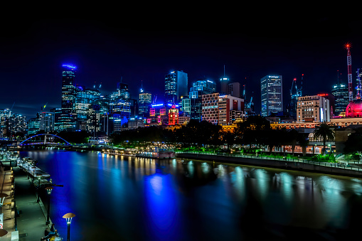 Melbourne, Australia - 05th March 2020:The city center, view to the skyline at night while walking along the river Yarra.