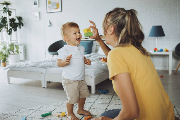 istock Mother and son playing with construction toys 1251719167