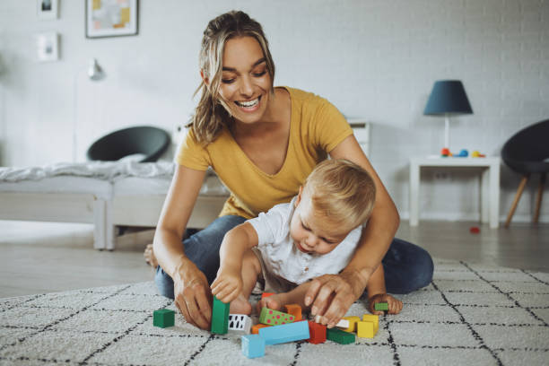 istock Mother and son playing with construction toys 1251719272