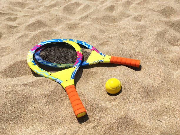 istock Rackets for playing with a ball on the sand 1251719766