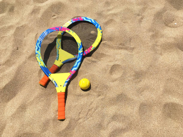 istock Rackets for playing with a ball on the sand 1251719767