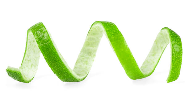 istock Peel of green lime on a white background. Lime twist. 1251720737