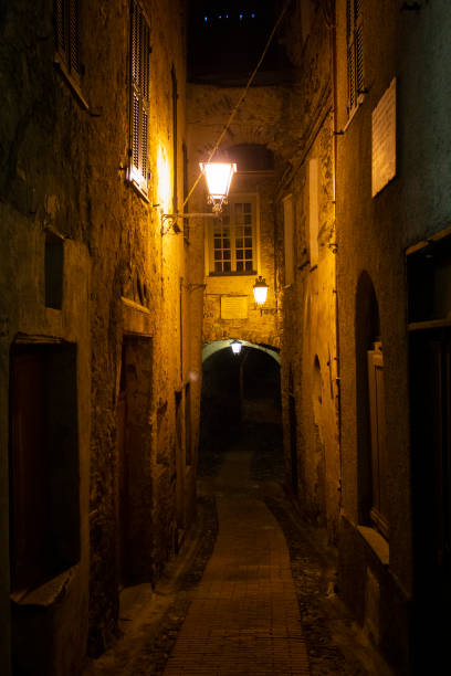 istock Narrow and mysterious road in a mountain town. 1251721094