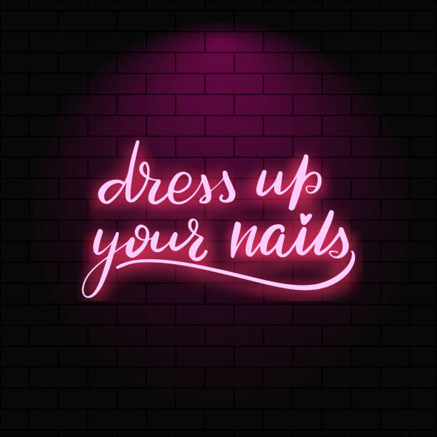 Neon glowing lettering on a brick wall background Dress up your nails. Neon glowing lettering on a brick wall background. Vector calligraphy illustration. Typography for banners, badges, postcard, t-shirt, prints, posters. dark pink dress stock illustrations