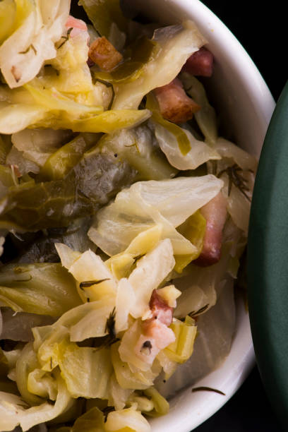 istock Stew of white cabbage and bacon. Vegetables, background 1251728591