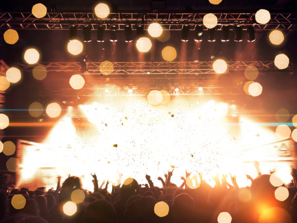 istock Concert hall with people silhouettes 1251731343