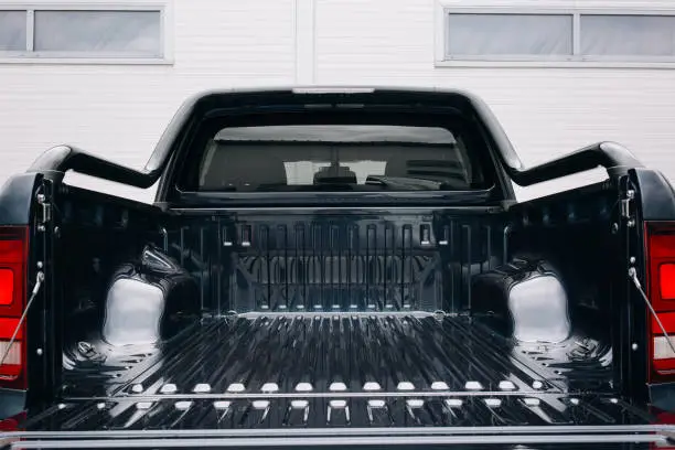 Pickup car with open trunk door