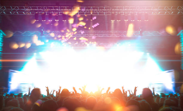 istock Filming concert on smart phone 1251731475