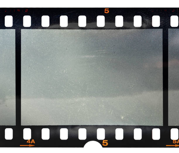 cool 35mm filmstrip or film material on white background stock photo