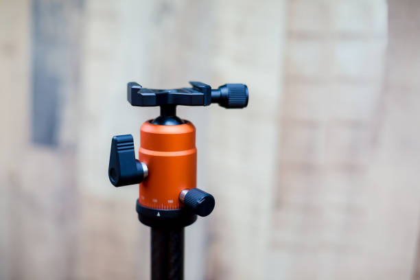 istock Tripod ball head close-up accessories on blurry background. 1251737217