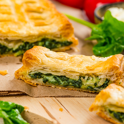 Spinach and Feta Cheese Strudel. Puff Pastry Filled with Spinach and Ricotta Cheese. Selective focus.