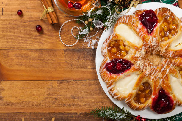 istock Danish Pastry Ring with Cherry, Apple fruit and Cheese fillings 1251738539