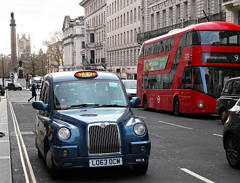 London taxi cab and red double decker bus