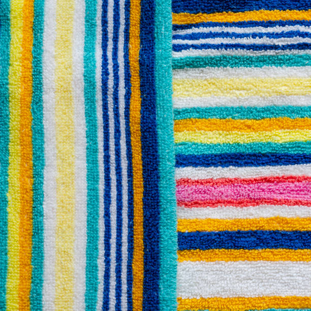 istock Multi-colored striped beach towel close-up. 1251741083
