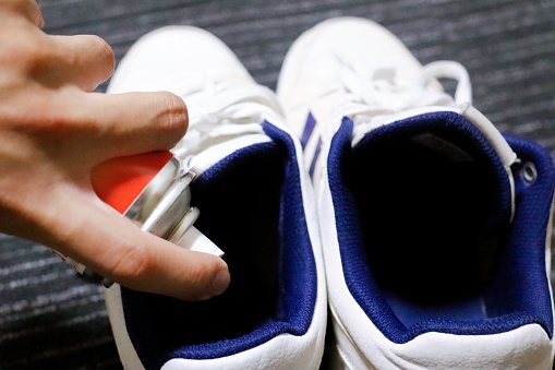 As he ties his shoes outdoors, he grounds himself in determination and focus, each lace a reminder of the importance of a strong foundation in achieving fitness goals and pushing beyond limits