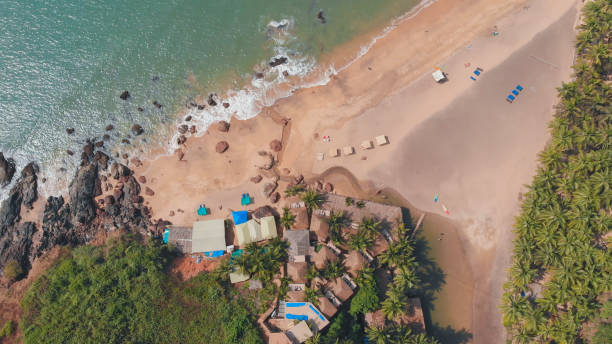 aerial drone view cola beach in the state of goa in india - goa beach india green imagens e fotografias de stock