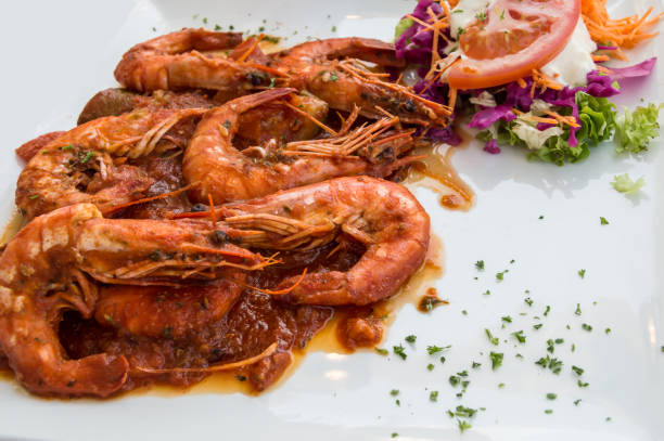 istock Baked prawns in tomato and cheese 1251767528