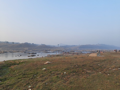 Beautiful view of the flowing river water. Barakar river karamdaha Ghat, border of Dhanbad Jamtara.This photo is of a cold morning. It is the second largest river and cleanest in Jharkhand India. Its length is 225 km (140 mil).Beautiful Scene.